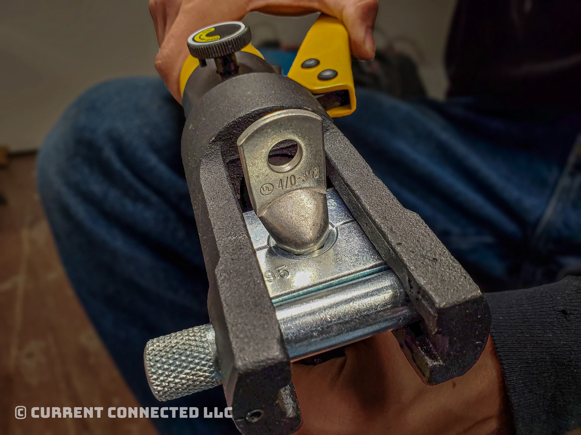 Photo of the wire in the crimper for a second time. 