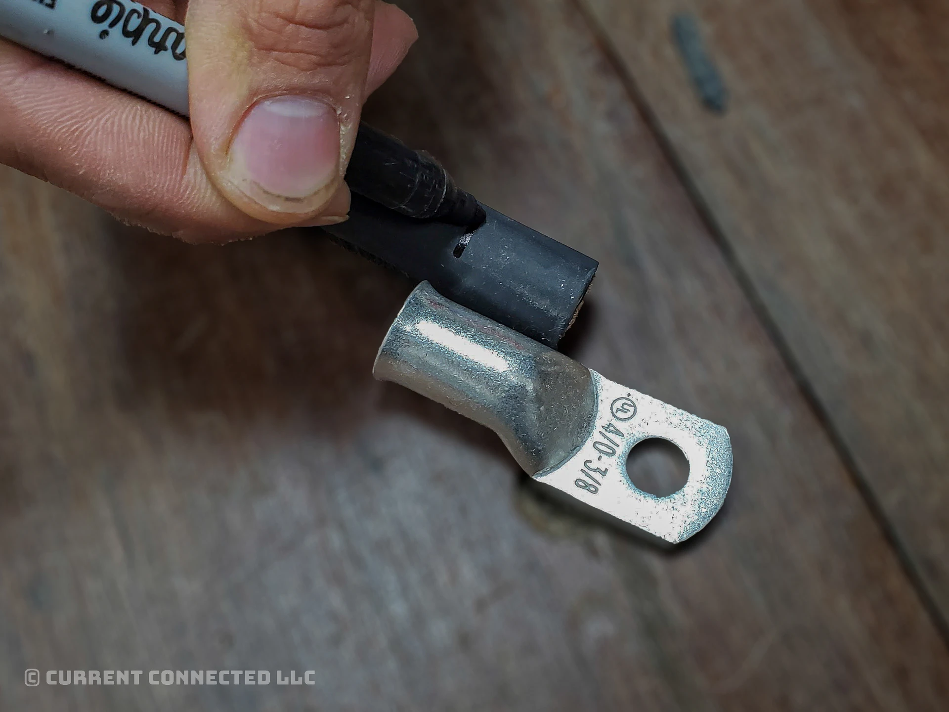 Photo of someone marking the strip length.