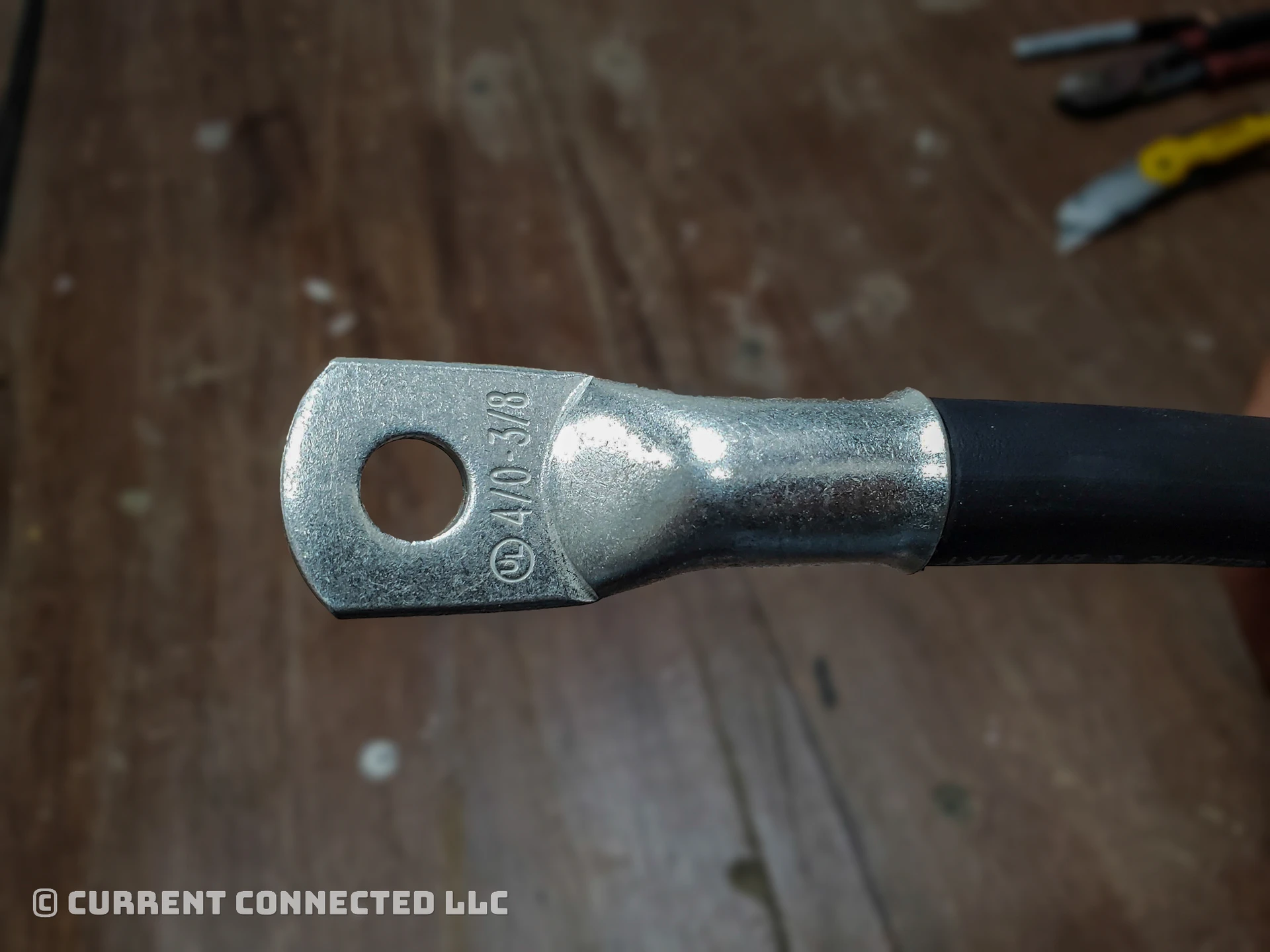 Photo of a wire with a lug on it. 